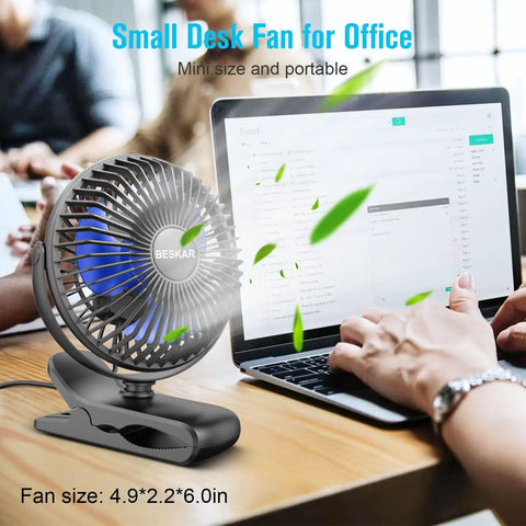 USB Clip On Desk Fan With Sturdy Clamp Tiny But Mighty Portable Personal Fan next to a laptop on an office desk