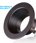 Side view of Rosewood 4 Inch Recessed Light Trim with metal step baffle and oil rubbed bronze finish for Halo Juno remodel housings