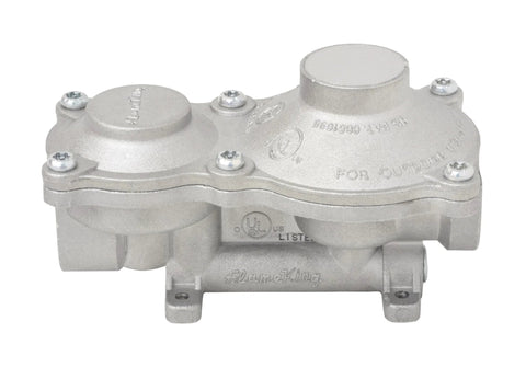 Flame King vertical propane regulator for RVs, front view; silver cast metal with mounting feet.