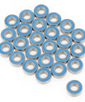 25 Pack Small Sealed Ball Bearings MR115 2RS 5x11x4mm Steel With Rubber Seals arranged in a cluster
