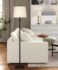 Traditional Black 3 Piece Lamp Set With White Fabric Shades Table Lamps And Floor Lamp Trio Perfect For Living Room Bedroom Study Includes Two 26.5 Inch Lamps And One 57.5 Inch Floor Lamp 100W E26 Compatible shown in modern living room.