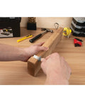 Person using Six Inch Stainless Steel Sliding Depth Gauge with Ultra Fine 64T Graduations for precise measurements on wood