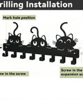 Installation guide for Wall Mounted Key Hooks With Eight Hooks Black Cat Themed Key Holder Rack showing screw placement.