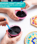 Hands holding grout and tools with mosaic tiles, Set of 2 Mosaic Kits for Adults, Diy Stained Glass Craft for Beginners nearby.