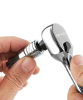 Hand using 63-Piece Torx Bit Socket And External Torx Socket Set Beefed-Up With Standard Torx T, drive adapter visible in use.