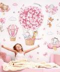 Cute Animal Wall Stickers Set With Hot Air Balloon Elephant Giraffe Bear And Airplane Designs For Girls Room Nursery Baby Bedroom Easy Peel And Stick Waterproof PVC Decals with child in pink room.