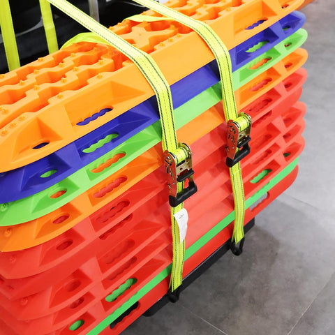 Heavy Duty Ratchet Straps 4 Pack 1-1/2 X 15 Ft With Coated Steel Ratchet securing colorful plastic traction boards