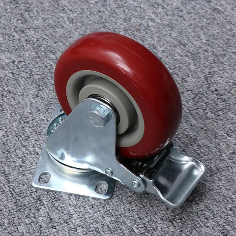 2pcs Red Dual Bearing Swivel Caster Wheels for Furniture and Carts with metal base and brake on gray carpet.