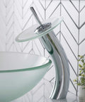 Tall Waterfall Vessel Sink Faucet With Frosted Glass Disk In Chrome Finish A Modern Bathroom Centerpiece That Pops Your Decor Built Tough Metal Construction For Smooth Flow And Easy Install. Elegant faucet beside matching sink.