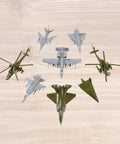 Top view of Must-Have 8 Piece 1/144 Scale Aircraft Model Set For Static Display And Easy Assembly Without Glue on wooden surface
