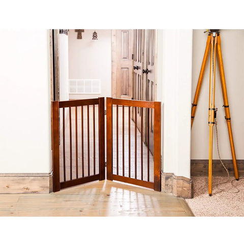 Extension Kit For 360 Configurable Walk Through Folding Pet Gate In Walnut Finish installed in doorway, 30 Inch Wide expansion.