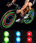 Cyclist with bike wheel lights in red, green, and blue for safer night riding; waterproof, easy to install; batteries included.