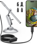 USB C Digital Microscope For Dope Close Ups With 10X To 200X Zoom, showing handheld camera with metal stand and connection to iPhone 15 Plus