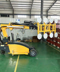 Heavy Duty Electric Glass Vacuum Lifter delivering rock solid suction grip for moving large metal plates in a warehouse.