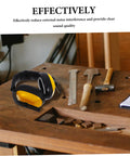 Lock Down Every Distraction Heavy Duty Noise Reduction Earmuffs on a workbench with tools, showing industrial design for hearing protection.
