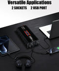 No Sweat Setup Heavy Duty Road Warrior 2000 Watt 12V DC To 110V AC Inverter with dual AC outlets and USB ports in use.