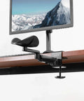Two Pack Clamp Adjustable Armrests Transform Your Home Office Into A Hella Comfy Haven With Flexible 360 Rotating Elbow Support And Sturdy Steel Base Stand For Epic Desk Setups In Classic Black mounted on a desk.