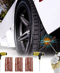 Flat tire repair kit with plug, insert tool, and wheel highlighted on a vehicle tire