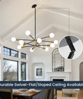 Modern Sputnik Chandelier Ceiling Light With 12 Lights In Gold And Black, shown in dining room with sloped ceiling.