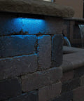 LED Color Changing Hardscape Light 6-Inch Multicolored With Oil Rubbed Bronze Finish illuminating stone wall