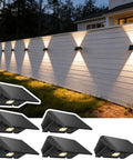 Solar Fence Lights Outdoor 6 Pack Up And Down Wall Lights Warm White Weatherproof Yard Decor with dusk to dawn sensor on wall.