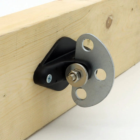 Close-up of Six Pack Pinlock Insulators With Three Point Gate Connector on wood, with durable black and silver base.