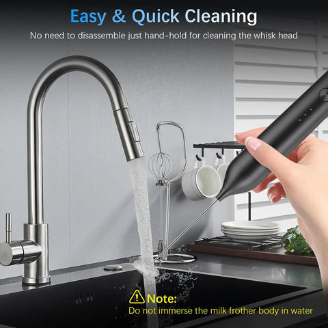 Rechargeable Milk Frother With Stand Quiet Electric Wand Foam Maker Detachable Stainless Steel Whisk being washed under a tap