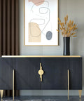 Stylish black cabinet with abstract art and wheat arrangement