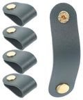 Premium Leather Cable Organizer Straps, dark green, five adjustable wraps keeping USB charger cables tidy.