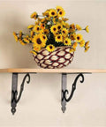 Heavy Hitter L Shaped Shelf Brackets 20 Pack Matte Black Steel Corner Supports with flowers in basket on shelf