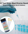 Person using pH Test Strips 0 To 14, 100 Strips Universal Litmus Paper for liquid testing with test tubes and dropper