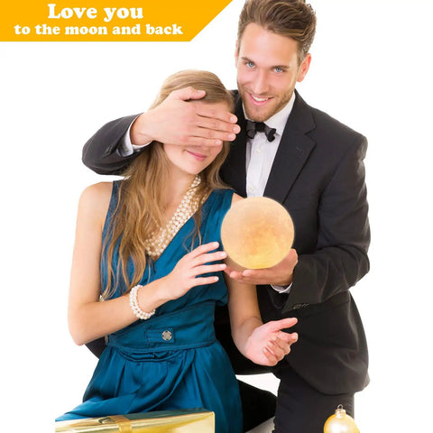 Couple holding 4.75 inch Moon Lamp 3D Printed LED Night Light, ideal for gift-giving occasions like Valentine's and Christmas