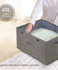 Collapsible Linen Fabric Storage Bin For Clothes Shoes And Toys Nifty Foldable Home Basket With Roomy Capacity To Keep Your Space Neat And Zero Stress Storage In Black with 40L storage, holding a pillow.