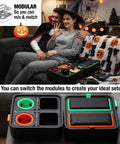 Couple using Ultimate Sofa Tray Caddy With Armrest Table, Phone Holder, Remote Organizer And Snack Storage, Gyro Stabilized Cup Holder For Living Rooms, RVs, And Cars Black And Green in living room.
