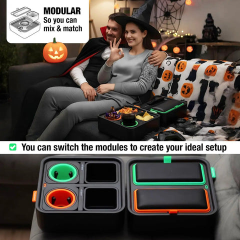 Couple using Ultimate Sofa Tray Caddy With Armrest Table, Phone Holder, Remote Organizer And Snack Storage, Gyro Stabilized Cup Holder For Living Rooms, RVs, And Cars Black And Green in living room.