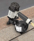 Pro Grade Coil Roofing Nailer Fires 1-3/4 Inch 15 Degree Fasteners With Lightweight Aluminum Body on roofing shingles.