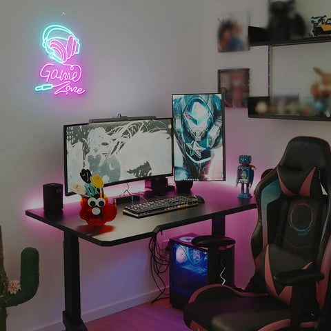 Gaming setup with neon sign, leather chair, and dual monitors