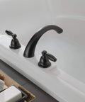 Claymore Two-Handle Widespread Roman Tub Faucet Trim Kit in Oil-Rubbed Bronze PTT298696-OB installed on bathtub