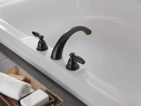 Claymore Two-Handle Widespread Roman Tub Faucet Trim Kit in Oil-Rubbed Bronze PTT298696-OB installed on bathtub