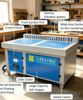 Heavy Duty Metalworking Downdraft Table With 3Kw Motor And 220V Power Pulling Serious Air Through Four Sided Suction For Welding Grinding Polishing And Deburring Dust Collection On A Beefy 59X39 Inch Workstation with control panel and suction ports.