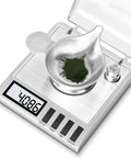 Digital Milligram Scale for ultra precise 50g capacity with 0.001g steps, spot on accuracy, tare function, auto off, six weighing units including g, oz, ozt, dwt, ct, gn, plus handy accessories for powder and lab use. Stainless steel scale with powder dish and cover