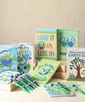 Earth Day Gift Bundle With Nine A5 Notebooks And Nine Globe Pens In Blue And Green, Eco Friendly Classroom Swag on display