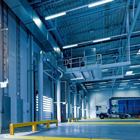Spacious warehouse with Hella Bright Three Foot LED Tube Light T8 16W 25W Equivalent Daylight 6500K 1600 Lumens installed overhead.