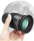 Hand holding a 2 Inch 30mm Eyepiece With 80 Degree Ultra Wide Field Of View For Telescopes against a full moon background.