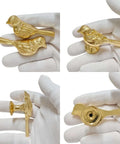 Must Have Bird Shaped Cabinet Knobs Set of 2, vintage metal drawer pulls in gold finish, showcased in gloved hand, 2.36 inches