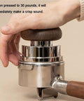 Dope Espresso Coffee Tamper Set With Self Leveling Distributor And Wdt Tool For Dead On Puck Prep Calibrated 58 Mm Pro Grade Tamper in use with wood handle.