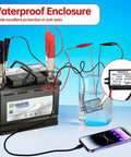 Rugged 12V To 32V 5V 5A Type-C Buck Converter For Cars Trucks And Motorcycles, shown connected to battery and phone in water test