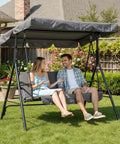 Three Person Outdoor Porch Swing Chair With Adjustable Canopy Breathable Fabric Seat Armrests in garden setting.