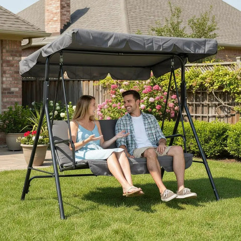 Three Person Outdoor Porch Swing Chair With Adjustable Canopy Breathable Fabric Seat Armrests in garden setting.