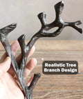 Badass Cast Iron L Brackets For Heavy Duty Shelf Storage With Straight Up Vintage Vibes Featuring Rustic Branch Shape And Damn Good Support In Classic Black, close-up of a branch design.